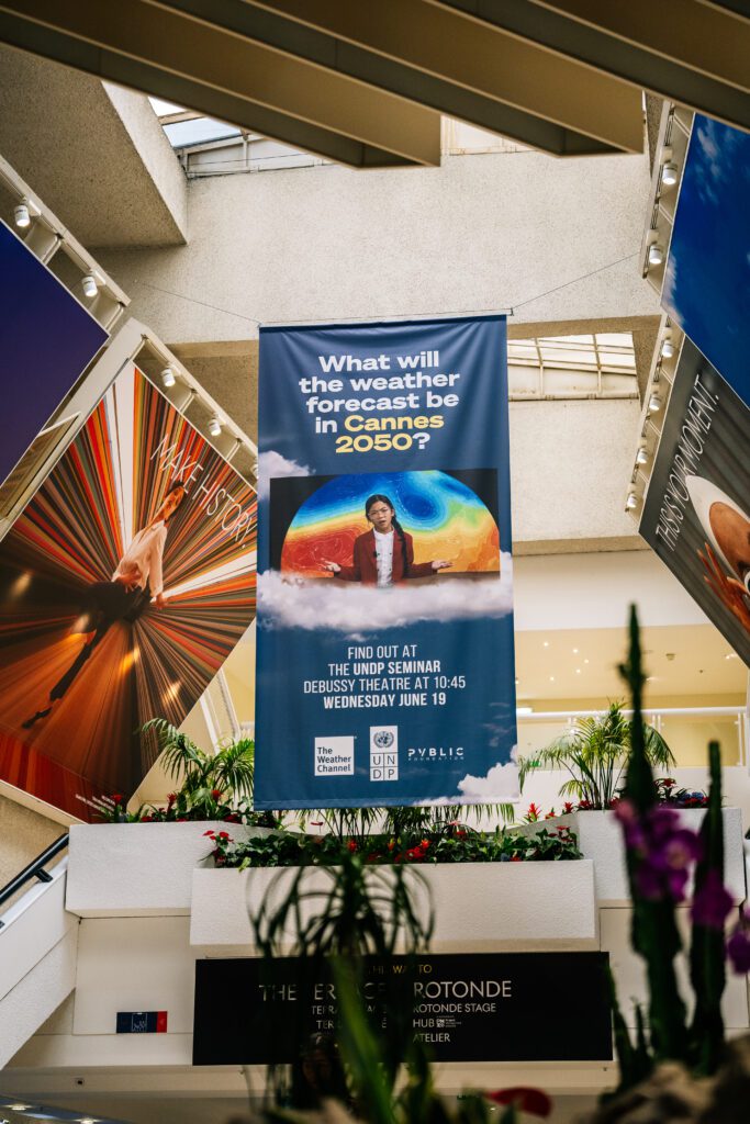 ‘Weather Kids’ campaign banner hanging inside the Palais des festivals